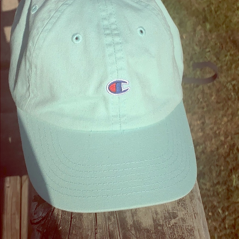 A turquoise Champion women’s hat